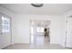 Bright entryway featuring ceramic floors, ceiling accents, and open access to the living area at 5608 Larimer Dr, Tampa, FL 33615