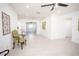 Spacious living room featuring ceramic floors, a ceiling fan, and stylish decor at 5608 Larimer Dr, Tampa, FL 33615