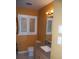 Bright bathroom featuring a granite countertop vanity, modern fixtures, and natural light at 6326 55Th N Ave, St Petersburg, FL 33709