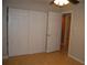 Bedroom with closet and multiple doors offers flexibility and storage at 6326 55Th N Ave, St Petersburg, FL 33709