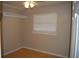 Well lit bedroom has a ceiling fan and a window providing natural light at 6326 55Th N Ave, St Petersburg, FL 33709