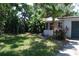 Exterior elevation view of a single-story home with landscaped front yard at 6326 55Th N Ave, St Petersburg, FL 33709