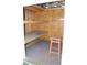 Interior view of storage shed with work bench and stool at 6326 55Th N Ave, St Petersburg, FL 33709