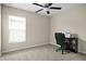 A simple, yet functional bedroom with a window and a small computer desk at 742 8Th Nw St, Ruskin, FL 33570