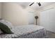Comfortable bedroom featuring a ceiling fan, carpeted floor, closet, and a large sunny window at 742 8Th Nw St, Ruskin, FL 33570