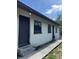Inviting single-story home with a welcoming front door and well-maintained walkway at 8317 N Marks St # A, Tampa, FL 33604