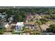 Aerial view of quiet neighborhood, with mature trees, brick streets, and updated construction at 905 W Fribley St, Tampa, FL 33603