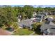 Charming single Gathering home with lush lawn, mature trees, backyard patio and detached storage at 905 W Fribley St, Tampa, FL 33603