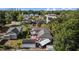 Aerial view of quiet neighborhood with mature trees, houses, brick streets and a view of Tampa at 905 W Fribley St, Tampa, FL 33603