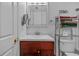 Bright bathroom features a white vanity sink, and modern fixtures at 905 W Fribley St, Tampa, FL 33603