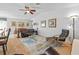 Inviting living area with ample seating, unique decor, and seamless access to the dining area at 905 W Fribley St, Tampa, FL 33603