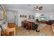 Spacious living room with wood-look floors, comfortable seating, and an abundance of natural light at 905 W Fribley St, Tampa, FL 33603