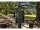 Sign in a park, rules posted: no alcohol or illegal drugs, and pets must be leashed and cleaned up at 905 W Fribley St, Tampa, FL 33603