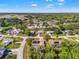 Expansive aerial view of a tranquil neighborhood surrounded by lush greenery and scattered homes at 9202 Jena Rd, Spring Hill, FL 34608