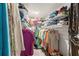 Spacious walk-in closet with ample shelving and hanging space for clothes and accessories at 9202 Jena Rd, Spring Hill, FL 34608