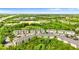A residential neighborhood including multi-Gathering homes and surrounding trees with location pin at 9519 Newdale Way # 202, Riverview, FL 33578