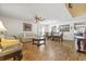 Spacious living room featuring hardwood floors, comfortable seating, and stylish decor at 10311 Frog Pond Dr, Riverview, FL 33569