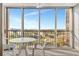 This balcony features a seating area with views of the surrounding landscape at 10355 Paradise Blvd # 502, Treasure Island, FL 33706
