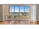 Balcony featuring outdoor seating and offering picturesque views of the city and waterfront at 10355 Paradise Blvd # 502, Treasure Island, FL 33706