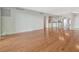 Bright living room showcasing hardwood floors, natural light, and an open floor plan at 10355 Paradise Blvd # 502, Treasure Island, FL 33706