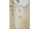 Shower stall with tan and neutral tile at 10355 Paradise Blvd # 502, Treasure Island, FL 33706
