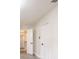Bedroom featuring wood-look floors, closet and access to a large, custom walk-in closet at 10733 Drummond Rd, Tampa, FL 33615