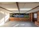 Spacious bonus room features a wall of windows overlooking the pool at 10733 Drummond Rd, Tampa, FL 33615