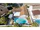 Aerial view of the home showcasing the pool and backyard at 10733 Drummond Rd, Tampa, FL 33615