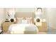 Bright bedroom with modern art, neutral bedding and wooden nightstands with lamps at 10873 Rustic Eve Ct, Land O Lakes, FL 34638