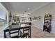 Open-concept living and dining area with sleek floors and contemporary decor, ideal for entertaining guests at 11121 Hudson Hills Ln, Riverview, FL 33579