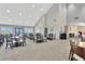Spacious clubhouse interior with ample seating, perfect for community gatherings and socializing at 11148 Hollander Ave, Hudson, FL 34667