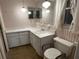 Bathroom vanity with white cabinets and a matching sink at 11198 58Th Ave, Seminole, FL 33772