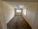 Bedroom features a ceiling fan, a window, and carpet at 11198 58Th Ave, Seminole, FL 33772