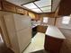 Kitchen features a range, cabinets, and lots of counter space at 11198 58Th Ave, Seminole, FL 33772