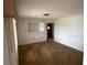 Spacious living room with a mirror, ready for renovation and personalization at 11198 58Th Ave, Seminole, FL 33772