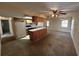 View of the living room connected to the kitchen at 11198 58Th Ave, Seminole, FL 33772