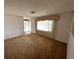 Bright living room features a window and entrance at 11198 58Th Ave, Seminole, FL 33772