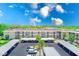 Aerial view showcasing covered parking and the well-maintained condo building at 12300 Vonn Rd # 7107, Largo, FL 33774