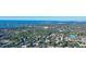 Gorgeous aerial shot of a waterfront community with lush green trees and waterways at 12300 Vonn Rd # 7107, Largo, FL 33774