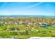 Aerial view overlooking the golf course, community, and ocean at 12300 Vonn Rd # 7107, Largo, FL 33774