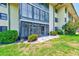 Beautiful screened-in lanai and lush backyard with mature landscaping at 12300 Vonn Rd # 7107, Largo, FL 33774