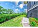 Private patio and backyard with lush greenery, perfect for relaxing or entertaining at 12300 Vonn Rd # 7107, Largo, FL 33774