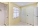 Kitchen area with white appliances, including a refrigerator and ample cabinet space at 12300 Vonn Rd # 7107, Largo, FL 33774