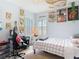 Bright bedroom featuring carpet, a neutral palette, natural light, and a study area at 13706 Osprey Fern Ln, Riverview, FL 33569