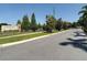 Hawks Fern community entrance featuring lush landscaping and a secure gate at 13706 Osprey Fern Ln, Riverview, FL 33569