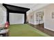 Versatile bonus room with golf simulator and plenty of space for entertainment and recreation at 13872 Siena Loop, Lakewood Ranch, FL 34202