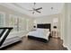 The main bedroom offers generous space, great natural light, and room for exercise equipment at 13872 Siena Loop, Lakewood Ranch, FL 34202