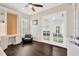 Bright office space with built-in desk and cabinetry, offering a functional and stylish work environment at 13872 Siena Loop, Lakewood Ranch, FL 34202