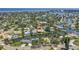 Aerial view shows a waterfront home and location with easy access to intercoastal waterways and Gulf beyond at 1449 45Th Ne Ave, St Petersburg, FL 33703