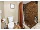 Bathroom featuring a toilet and a tiled walk-in shower at 1449 45Th Ne Ave, St Petersburg, FL 33703